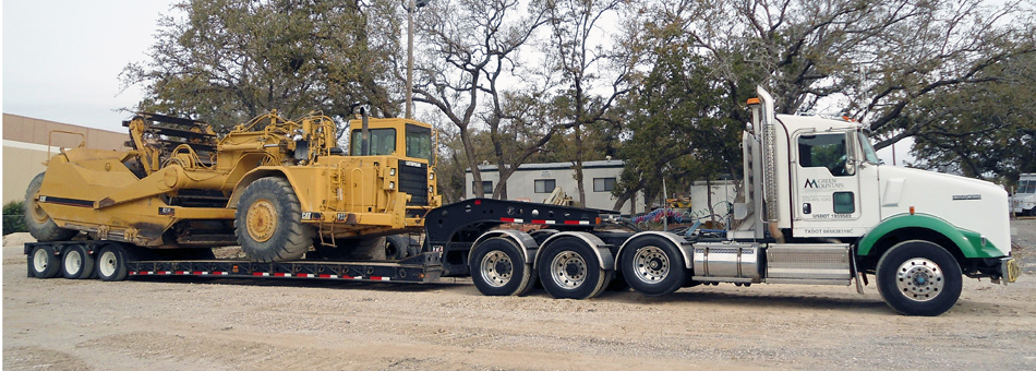 Truck loaded with scraper
